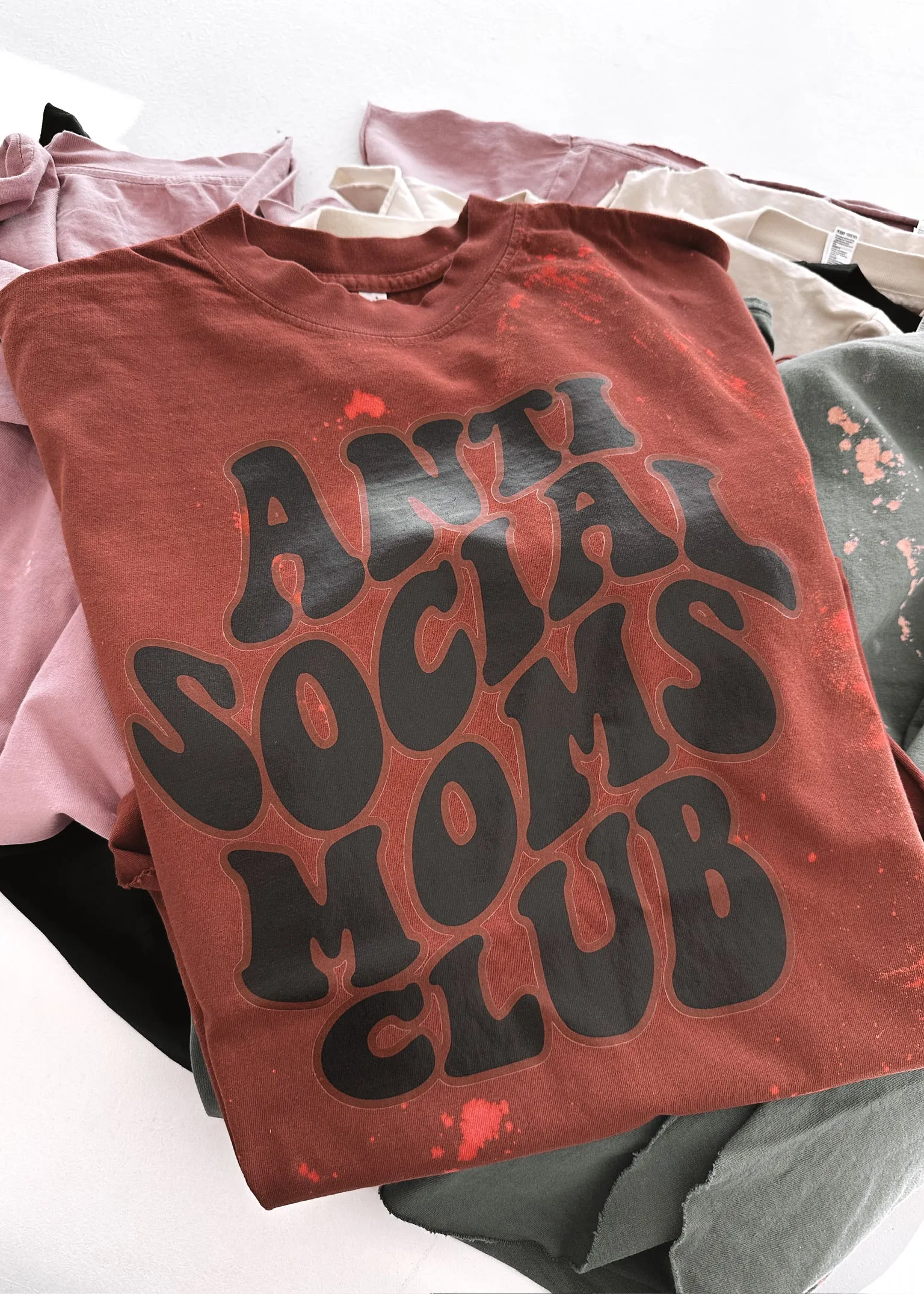 ANTISOCIAL MOMS CLUB BLEACHED OUT SIDE SLIT TEE