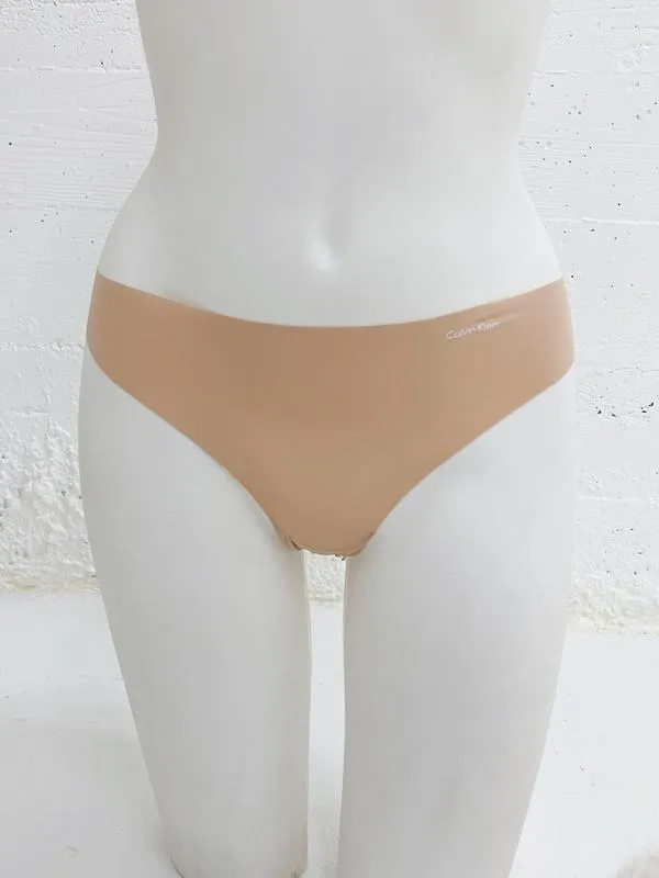Calvin Klein Women's Invisibles 5 Pack Seamless Thong Light Caramel QD3556 274