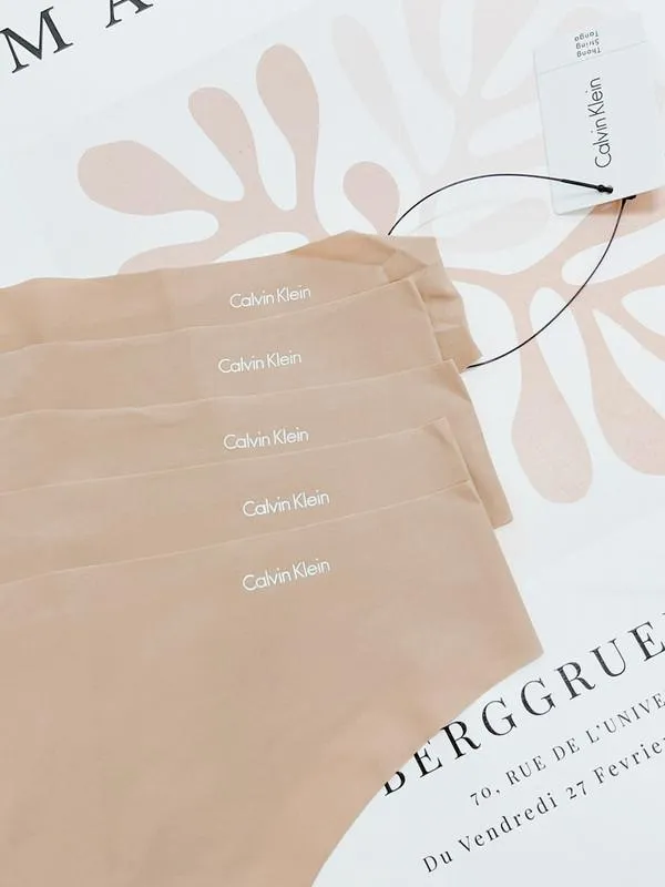 Calvin Klein Women's Invisibles 5 Pack Seamless Thong Light Caramel QD3556 274