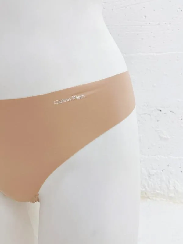 Calvin Klein Women's Invisibles 5 Pack Seamless Thong Light Caramel QD3556 274