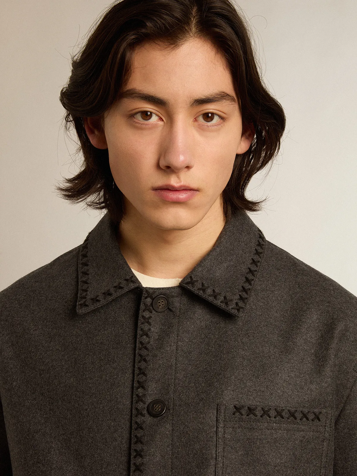 Gray melange woolen jacket with button fastening